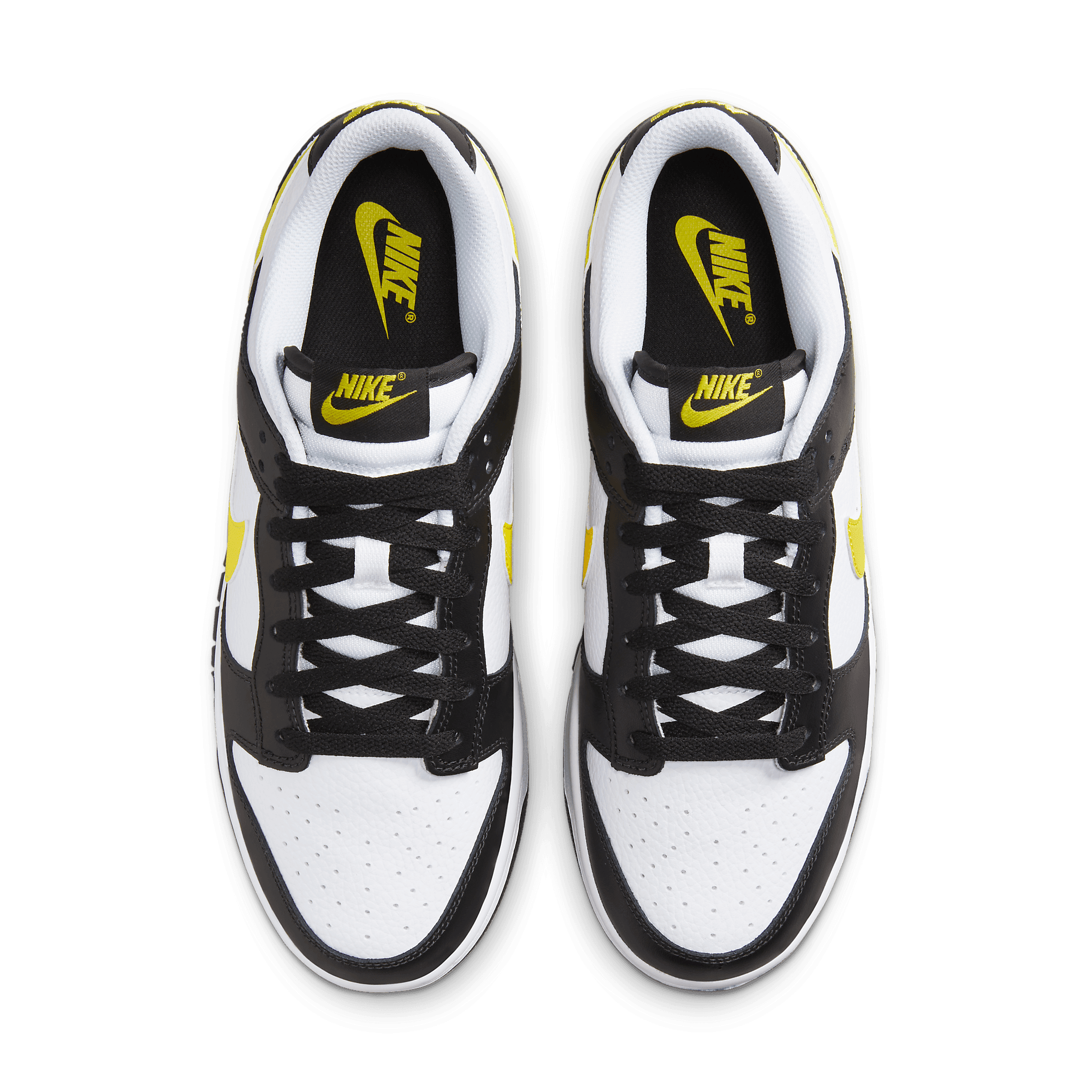 Yellow Branding Details Appear On This Black And White Nike