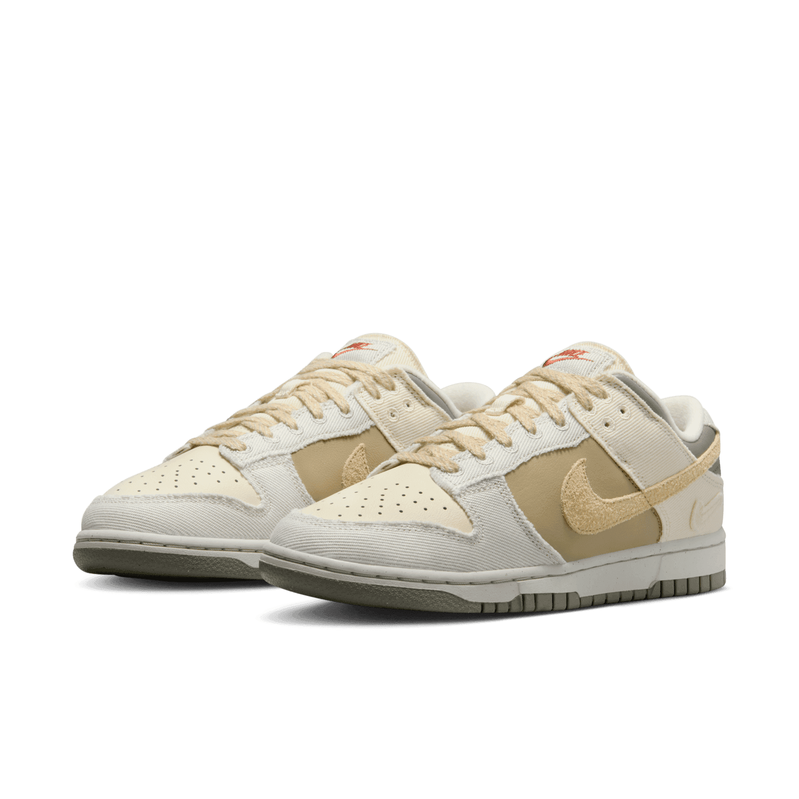 The Women's Nike Dunk Low Light Bone Dark Stucco Releases