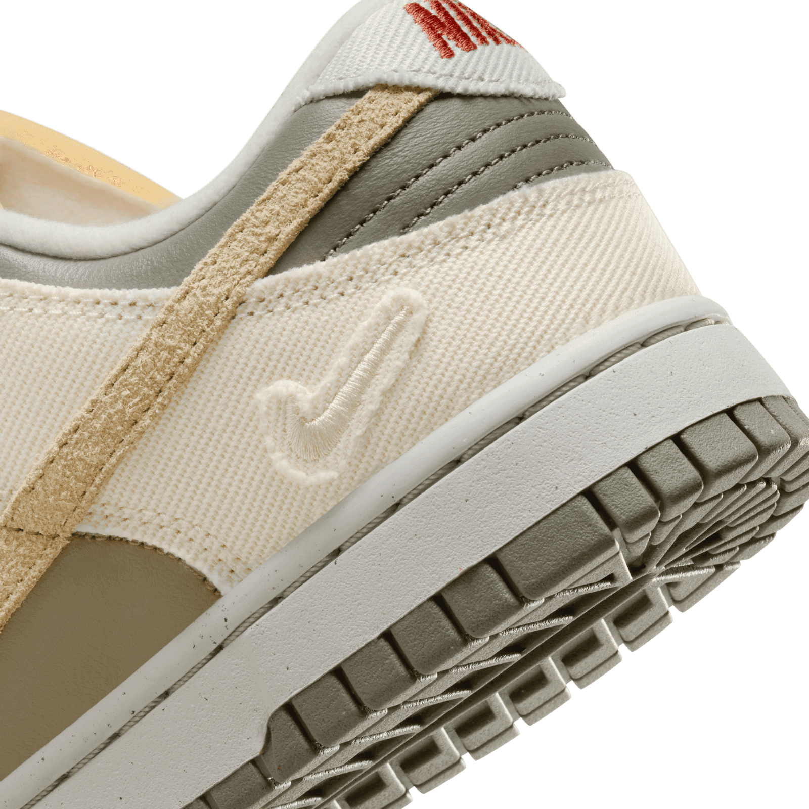 The Women's Nike Dunk Low Light Bone Dark Stucco Releases March 2024
