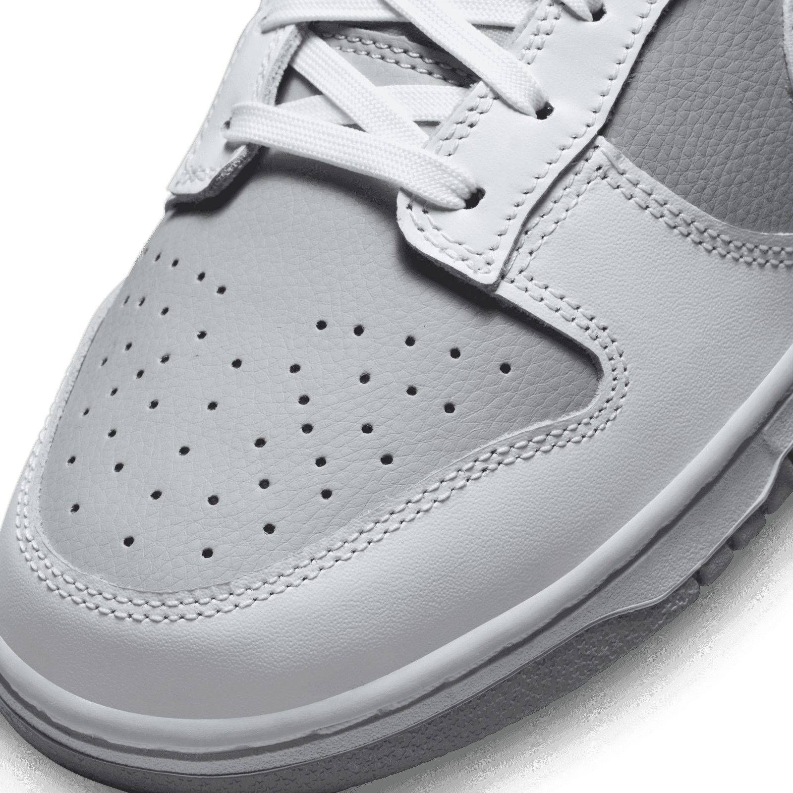 Pristine Grey And White Hues Adorn The Nike Dunk Low