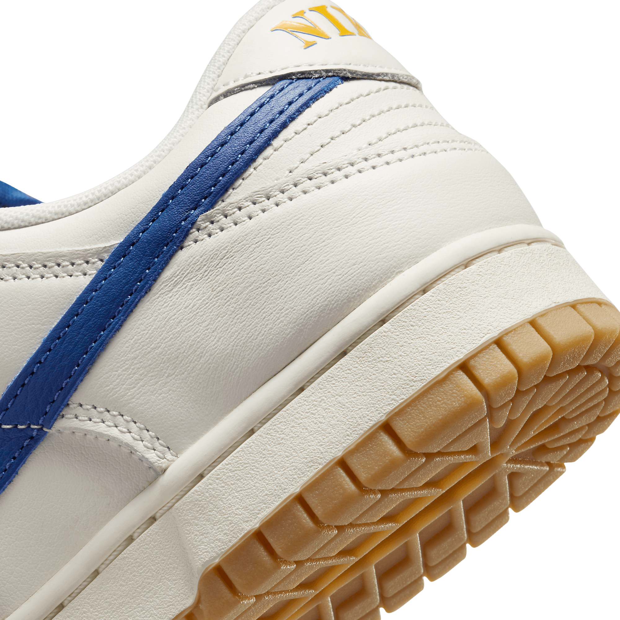 Gum Bottoms Finish Off The Nike Dunk Low Sail Blue