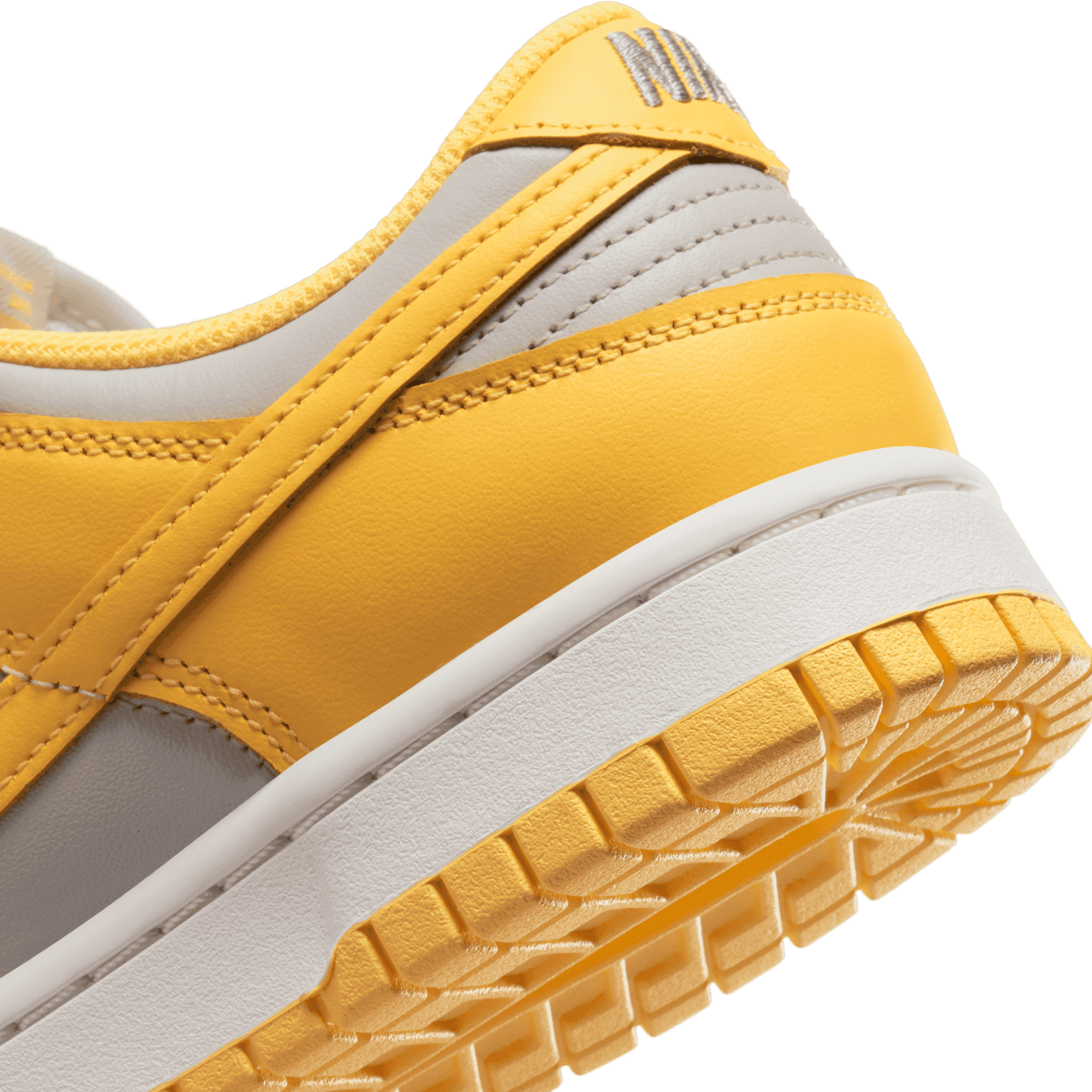 This Women's Nike Dunk Low Comes In Light Bone Citron Pulse