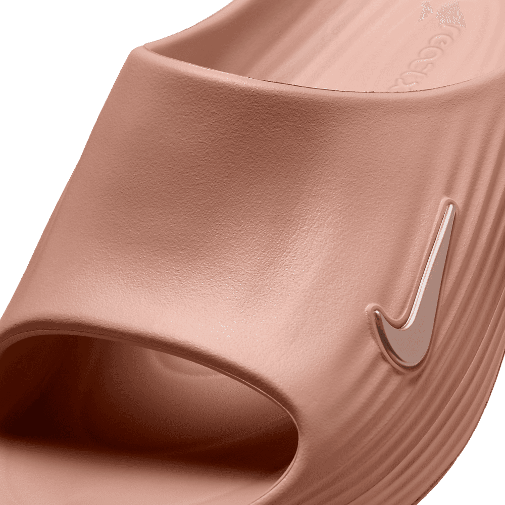 The Women's Nike ReactX Rejuven8 Slide Rose Gold Releases